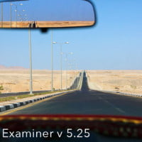 Photo of empty road from car with rear view mirror visible in feature article called Looking Back at Recruiting in HRExaminer.com v5.25 for June 27, 2014