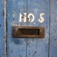 photo of door with letter opening and number 5 in HRExaminer.com article 5-Links on How Things Work by John Sumser published July 1, 2014