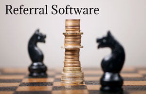 Photo on HR Examiner showing chess pieces and text referral software.