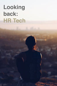 photo of woman looking back over Los Angeles