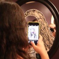 photo of woman taking selfie in mirror on HRExaminer.com article by Heather Bussing April 20, 2015