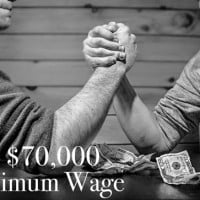 photo of people arm wrestling over money in HRExaminer.com article by Paul Hebert on GravityPayments pay issue