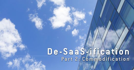 photo of office building with white clouds over blue sky in HRExaminer article, De-Saas-ification part 2