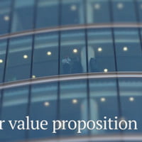 photo of office tower with man standing in window in HRExaminer.com feature article in Weekly Edition v7.13 for April 1, 2016