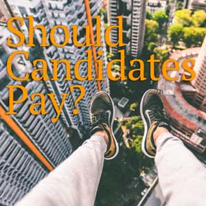 photo of person's legs dangling over edge of tall building. Photo by Alex Wong cc0 Pexels in HRExaminer.com article Should Candidates Pay by John Sumser on Elevated Careers
