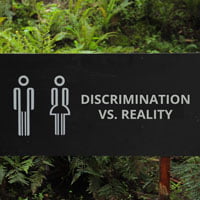 2018-06-25-hrexaminer-photo-img-cc0-via-pexels-by-hafidz-alifuddin-directions-gender-outdoors-88808-full-discrimination-vs-reality-heather-bussing-sq-200px.jpg