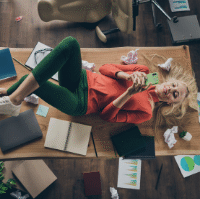 woman on messy desk on phone 2021-01-28 HR Examiner Sam Bocetta article HRs role in Strengthening the People Side of Security stock photo img cc0 by AdobeStock 303528150 sq 200px.gif